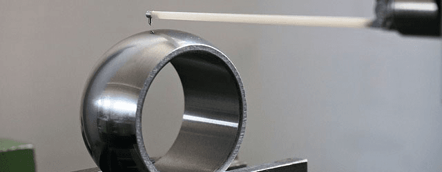 Roughness tester measuring a part