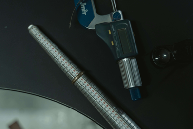 Micrometer on a table for thickness measurement operation